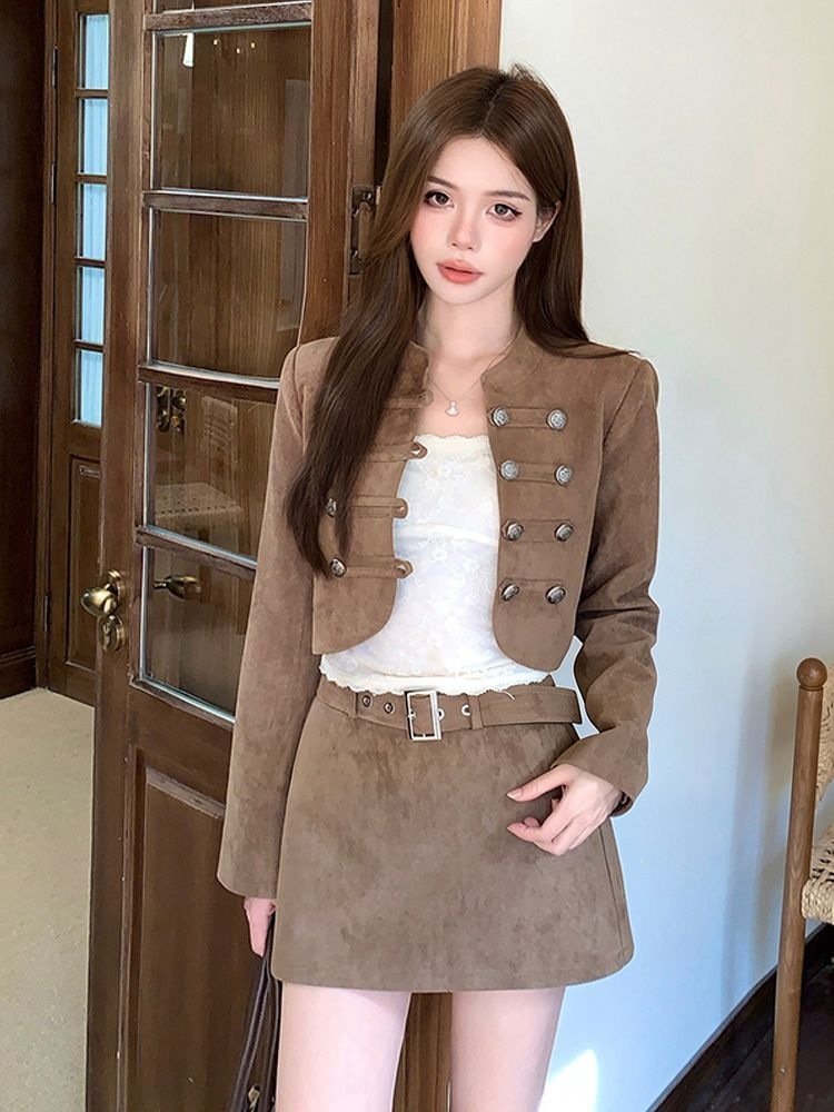 New two-piece set featuring a retro, stand-up collar, short, double-breasted jacket, and an A-line skirt2026